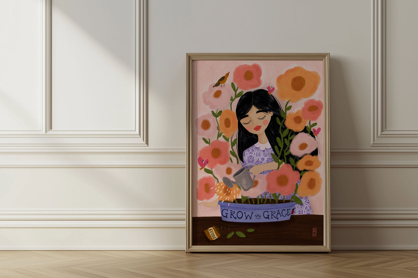 Framed artwork of a woman with flowers on a wall