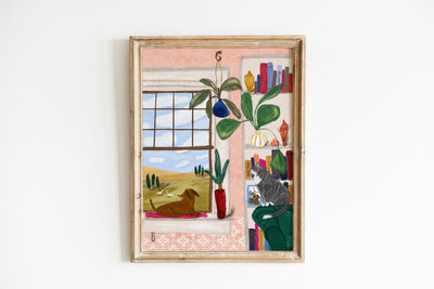Framed artwork of a room with a window, plants, and books on a white wall.