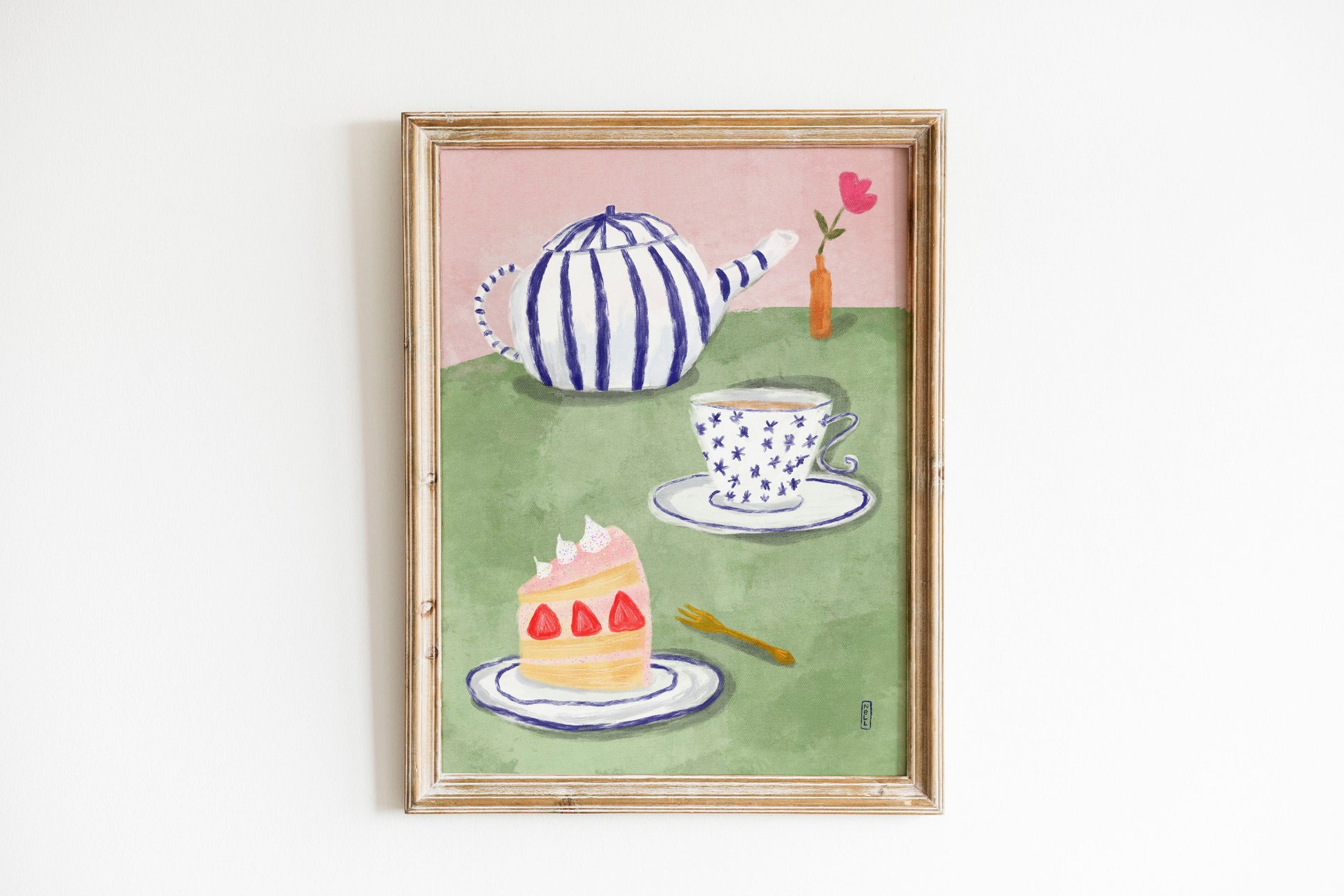 Framed artwork of a teapot, cup, saucer, and cake on a green background.