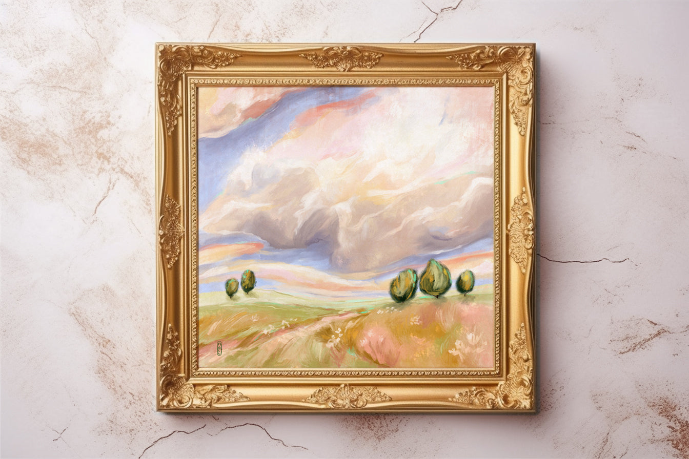 Framed painting of a landscape with trees on a marble surface