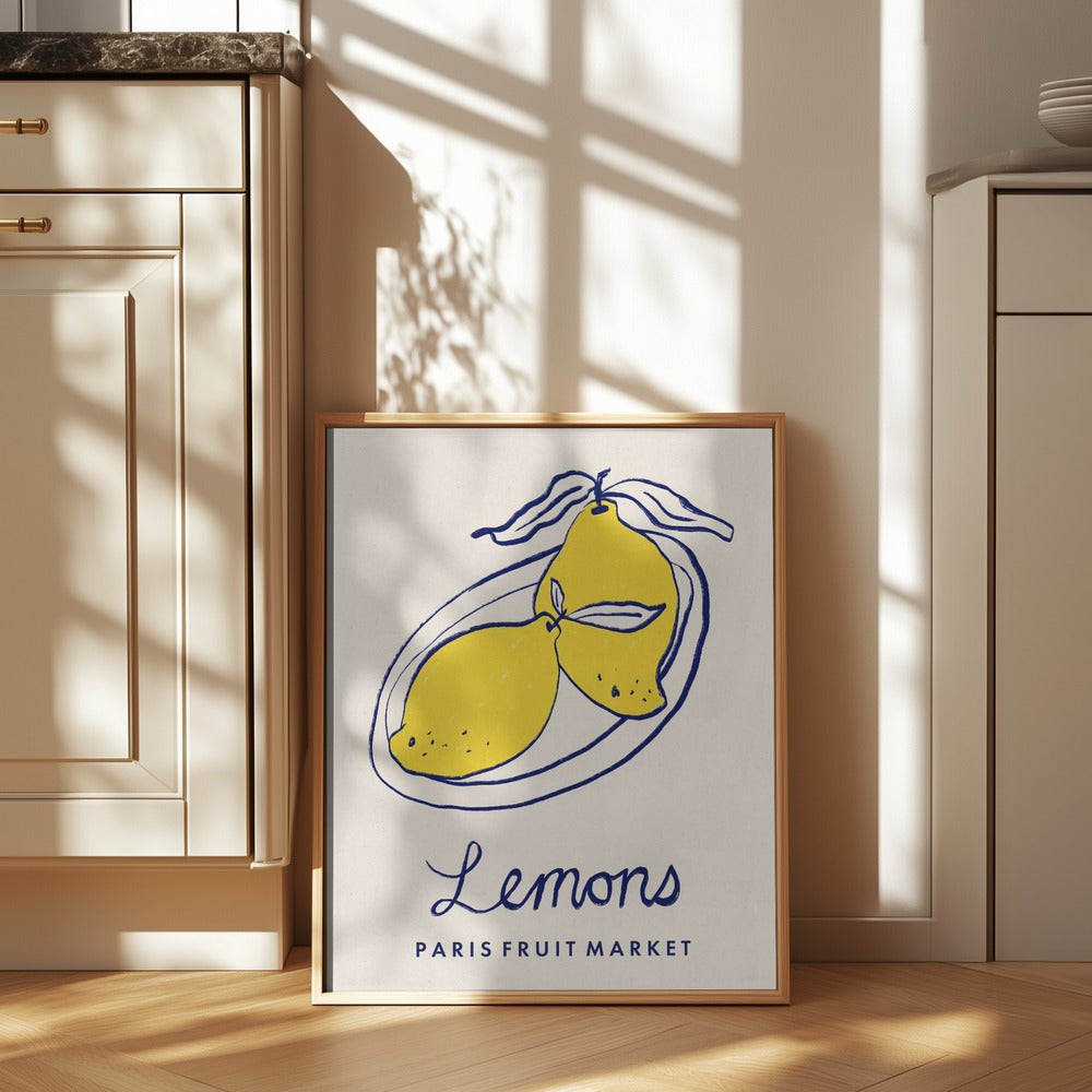 Framed artwork of lemons with 'Paris Fruit Market' text in a kitchen setting