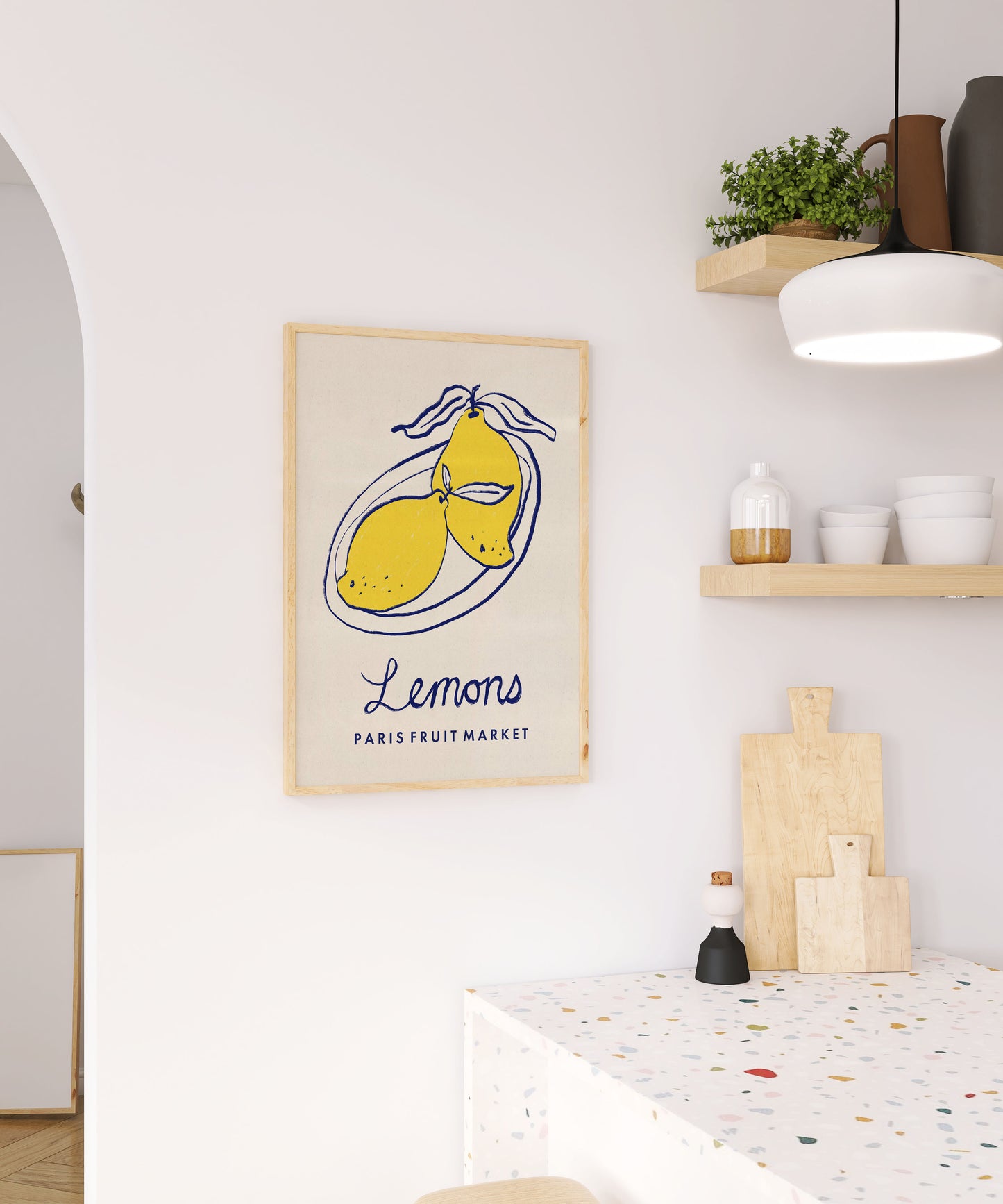 Kitchen interior with a 'Lemons' poster on the wall