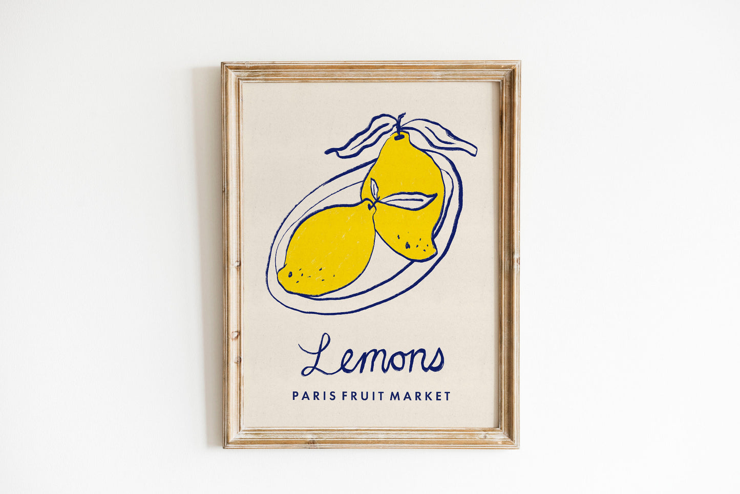 Framed artwork with lemons and 'Lemons Paris Fruit Market' text on a white background