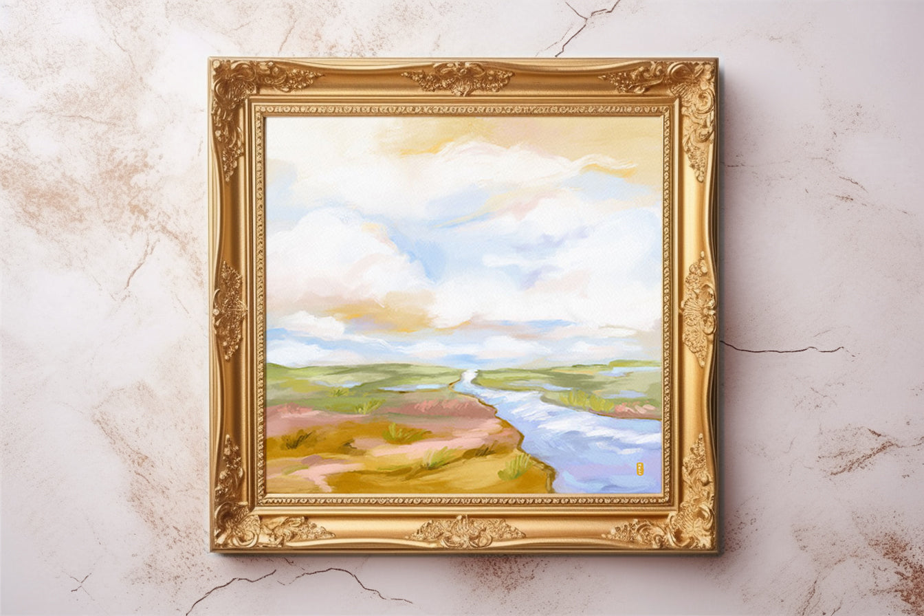 Framed landscape painting on a marble surface