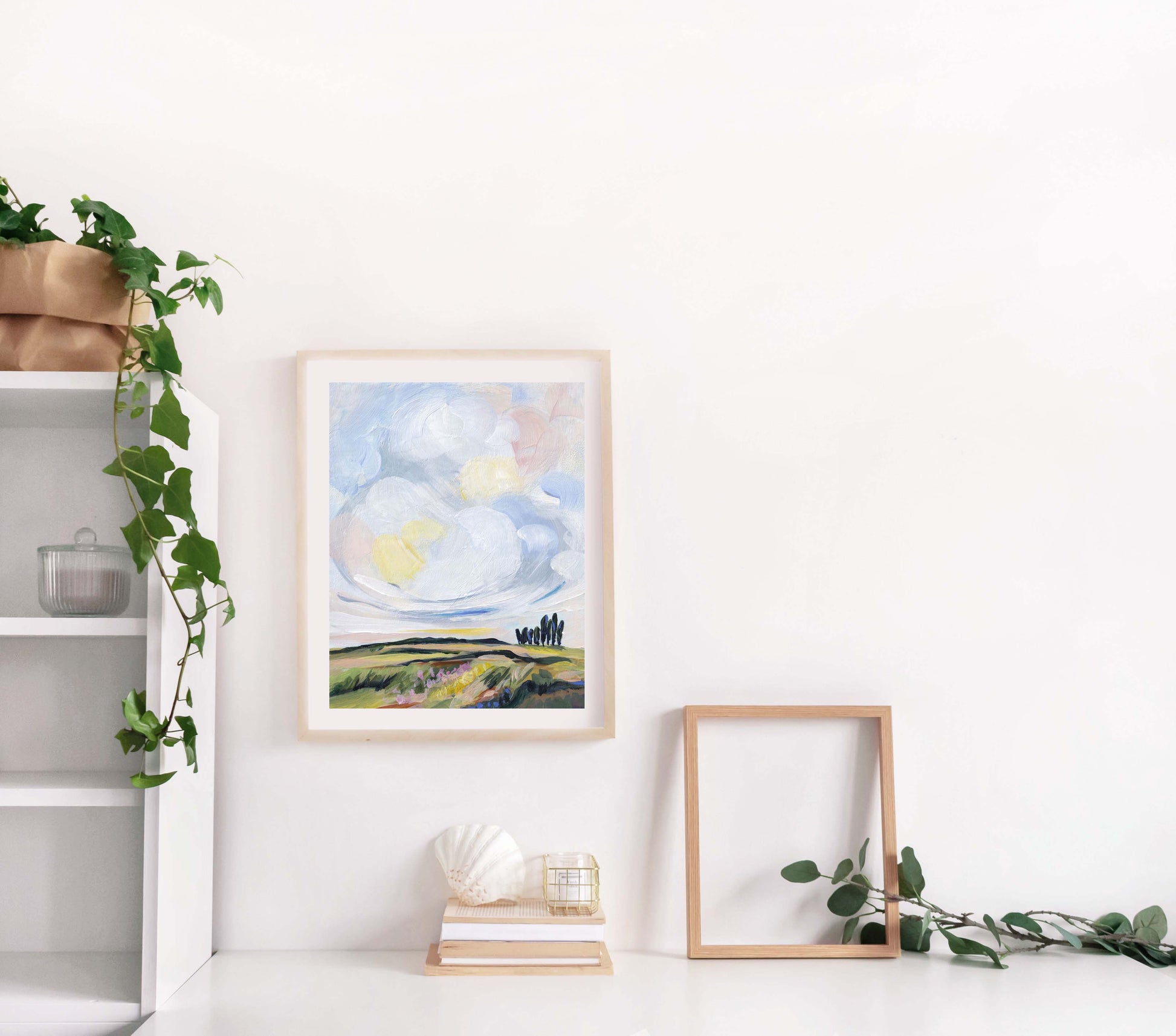 Framed artwork on a wall with decorative elements